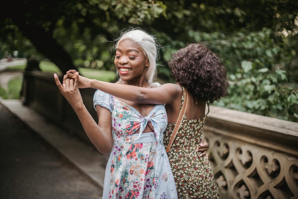 Two black women using dance as somatic healing